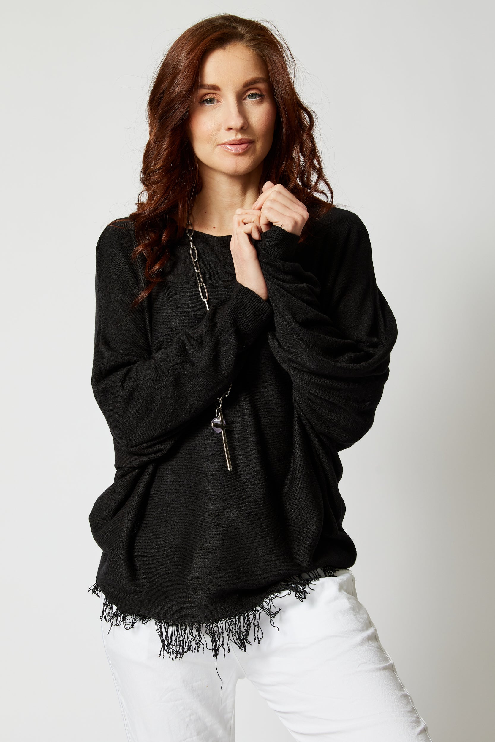 Sweater with fringe on best sale bottom